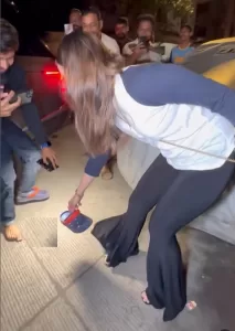 Alia Bhatt holding Sandal